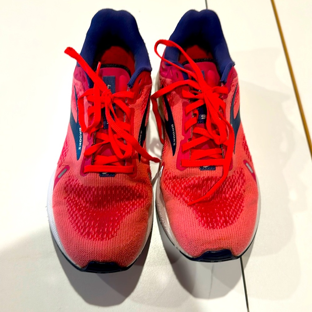 Brooks Launch 9. Bright orange tennis shoes. Size 9. Pre-owned